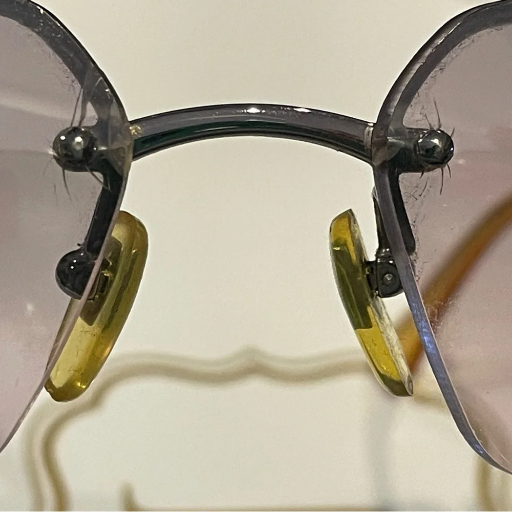Coach Gold and Gray Sunglasses Rimless Design